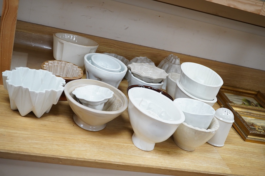 Twenty early 20th century ceramic jelly moulds, including an example by Shelley, etc. Condition - fair